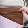 Anti-theft water resistant Crissy Full Crossbody. Demonstration of RFID blocking built in wallet