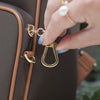 Anti-theft water resistant Carmel convertible Backpack with zipper clasps to secure bag closed